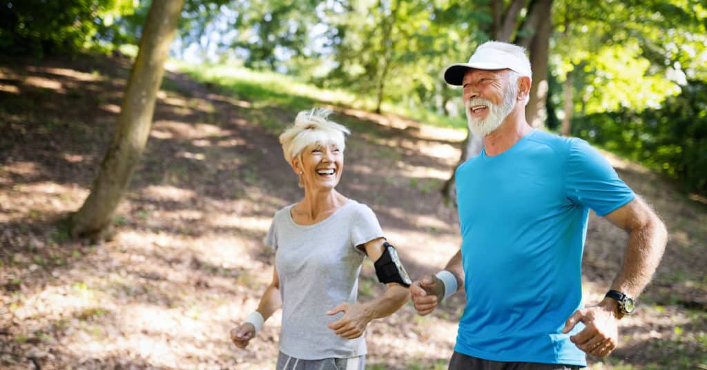 senior citizens staying active with daily walks to prevent alzheimer's diisease